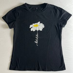 Black tee with daisy motif